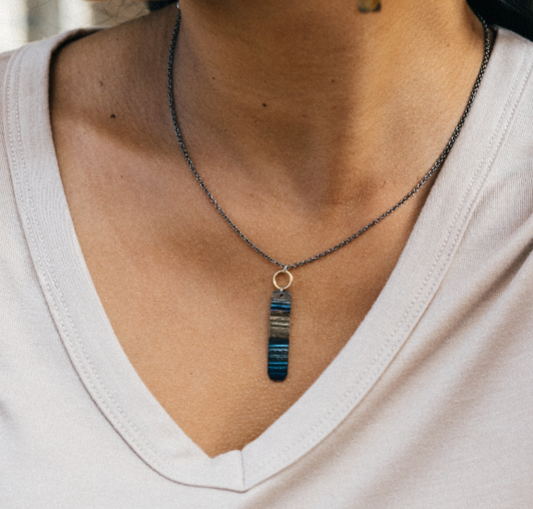 Ripple Effect Necklace by Mend on the Move. Jewelry created from auto parts by abuse survivors in Detroit, Michigan.