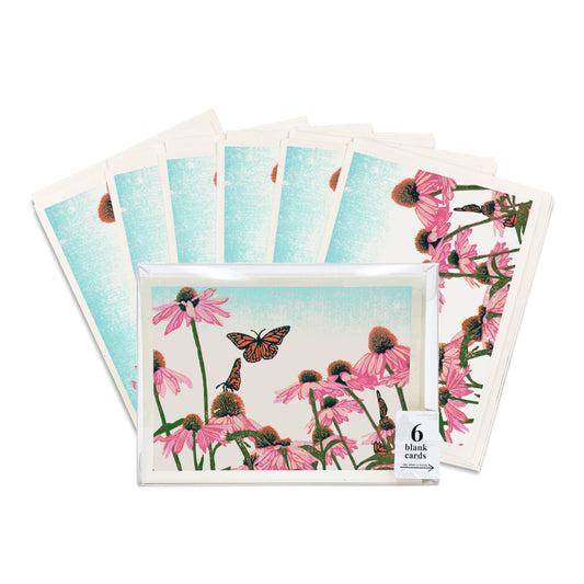 A boxed set of six casually elegant cards featuring floral art by Natalia Wohletz.