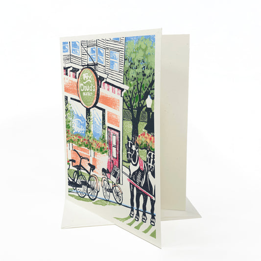 Doud's Market #2. A casually elegant card featuring a digital reproduction of a block print design with the same title by Natalia Wohletz of Peninsula Prints, Milford and Mackinac Island, Michigan.