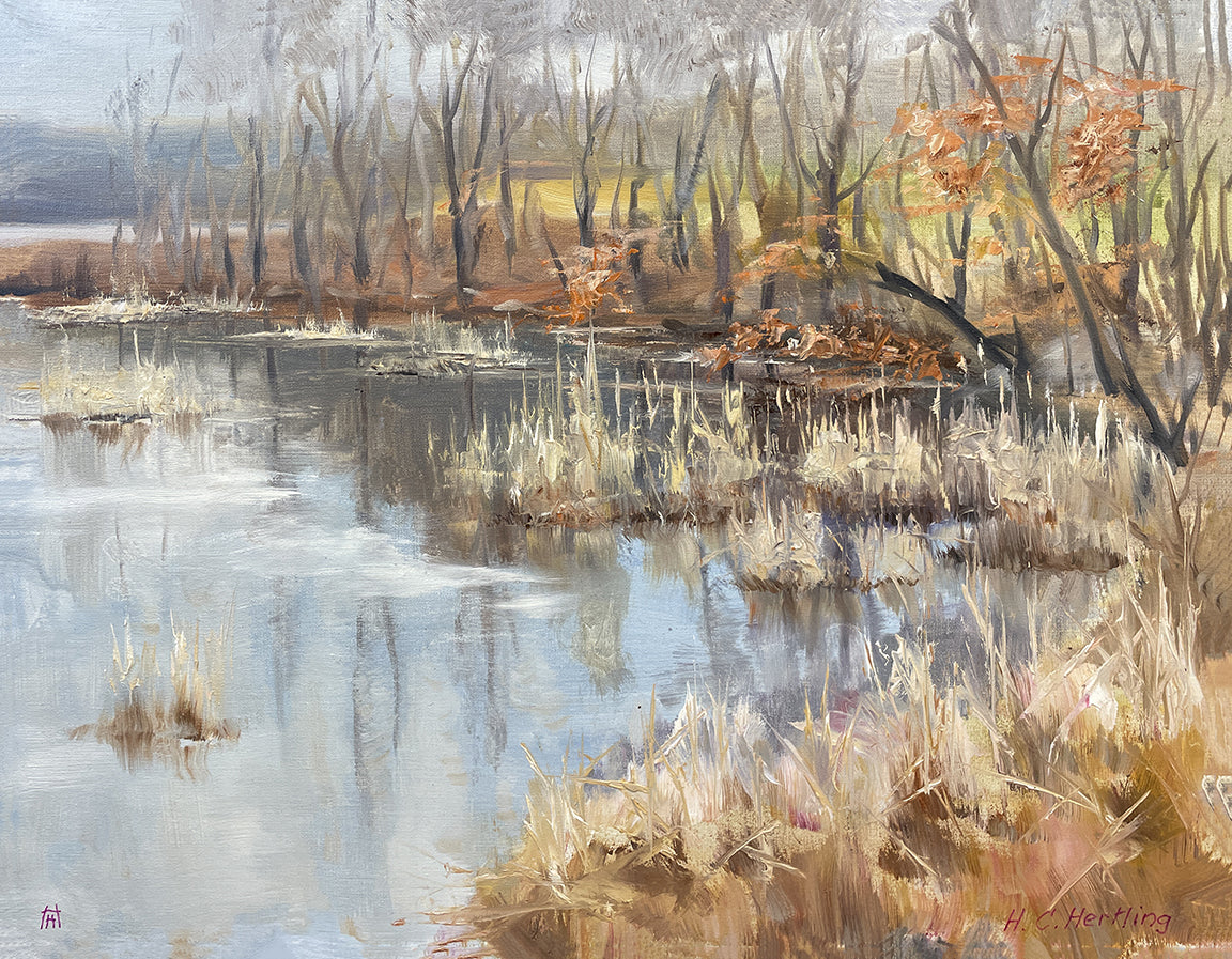 Heiner Hertling’s oil painting captures a serene lakeshore kissed by the first frost of fall, celebrating nature’s crisp and cozy charm.