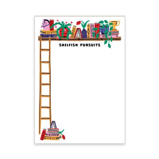 Notepad with a colorful illustration of books and a ladder, featuring the words, 'Shelfish Pursuits'.