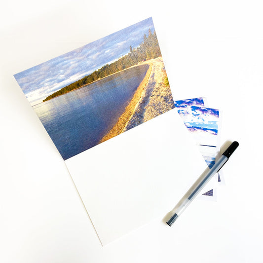 Blank greeting card featuring a photograph of the Mackinac Bridge by local photographer Jennifer Wohletz of Mackinac Island, Michigan. Open the card to discover another photo inside! May be customized for Mackinac Island wedding invitations, announcements and thank you notes. Made in Michigan.
