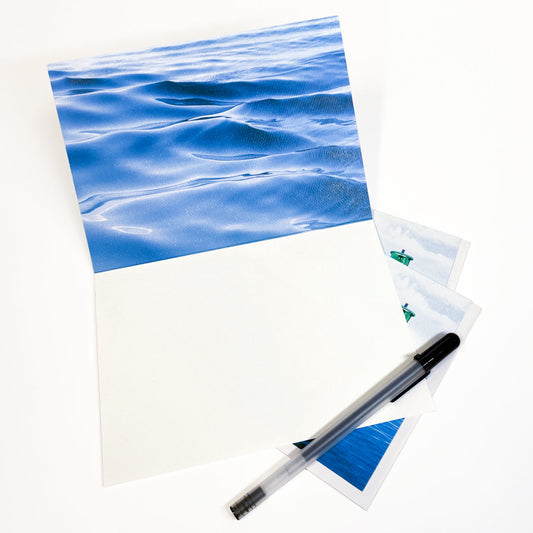 Blank greeting card featuring a photograph of the Round Island Lighthouse near Mackinac Island, Michigan, by local artist Jennifer Wohletz of Mackinac Memories.