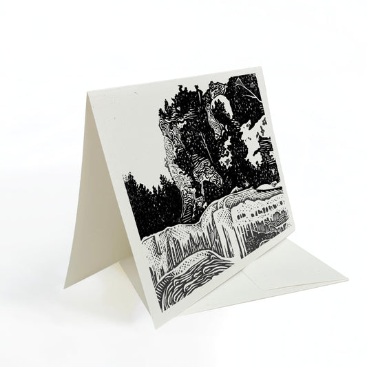 A casually elegant card featuring Mackinac Island art by Natalia Wohletz titled Arch Rock in Winter