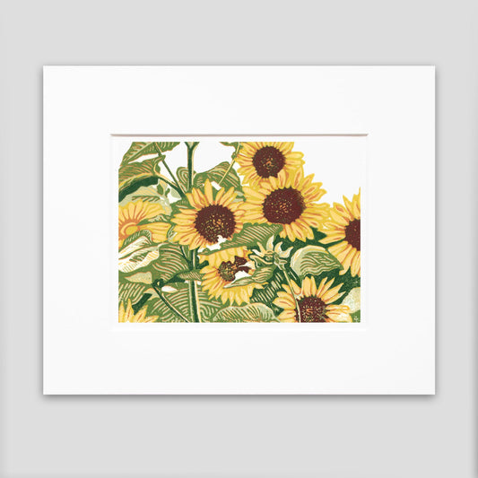 Sunflower Patch is a fun, dynamic hand-pulled and hand-carved seven-color print meant to elicit joy and a sense of belonging. The floral art was created by Michigan printmaker Natalia Wohletz of Peninsula Prints.