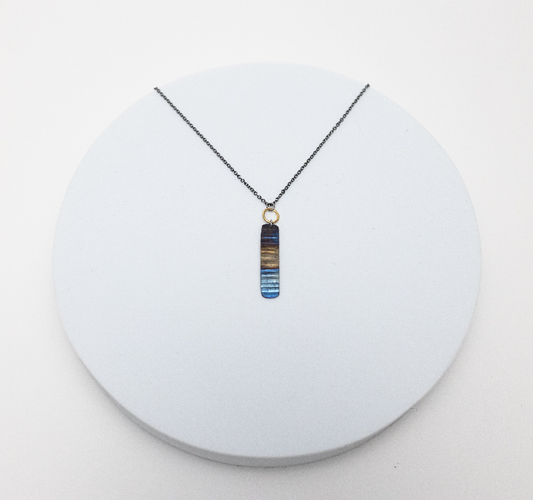 Ripple Effect Necklace by Mend on the Move.  Jewelry created from auto parts by abuse survivors in Detroit, Michigan.