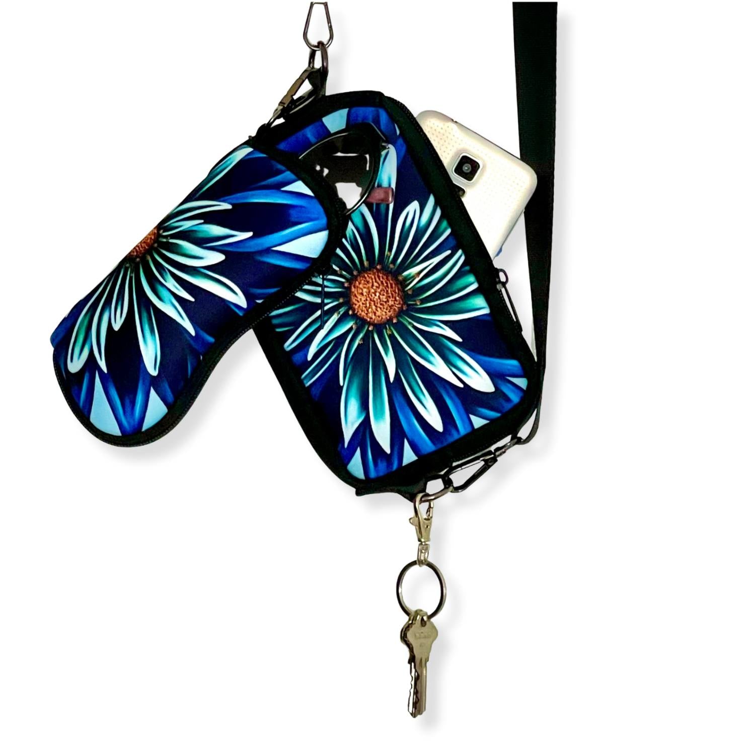 Floral patterned phone case with keychain and lanyard.