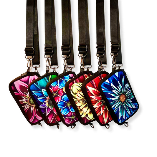 Set of colorful floral designs on black straps.