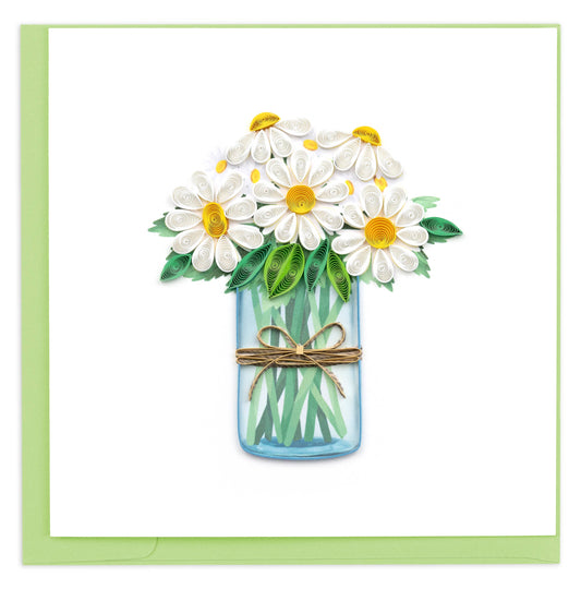 A greeting card featuring a handcrafted quilled daisy floral arrangement in a jar with a green background.