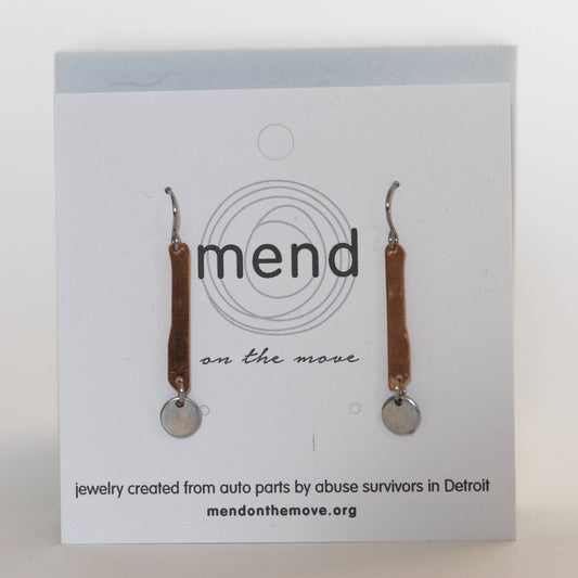 Earrings by Mend on the Move.  Jewelry created from auto parts by abuse survivors in Detroit, Michigan.