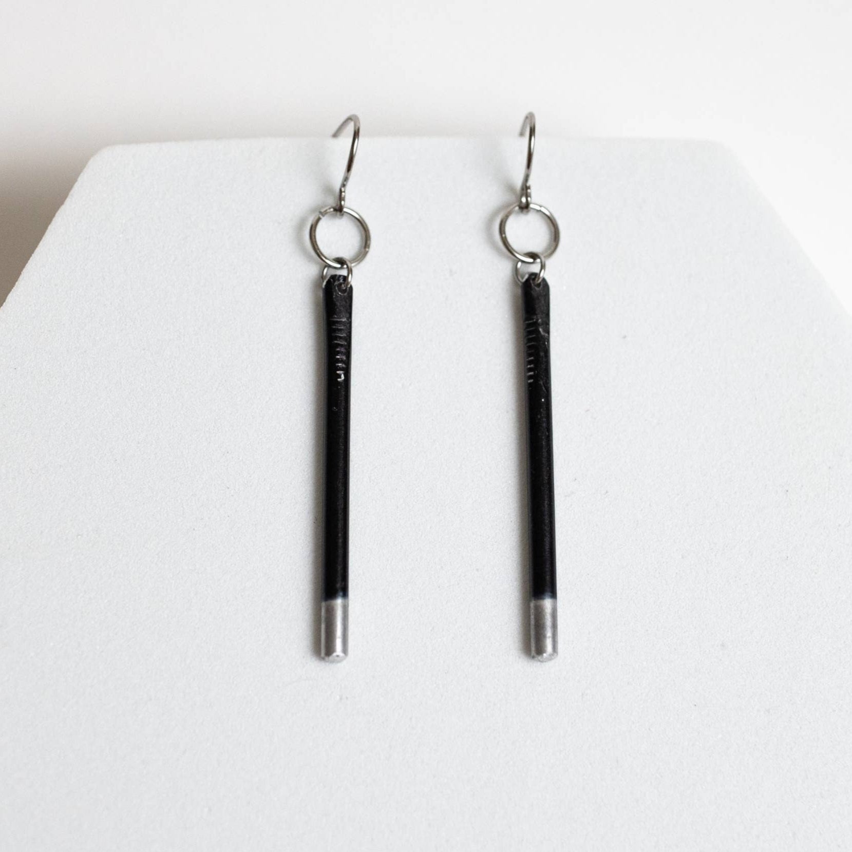 Stand By Me Steel Earrings by Mend on the Move jewelry created from auto parts by abuse survivors in Detroit.