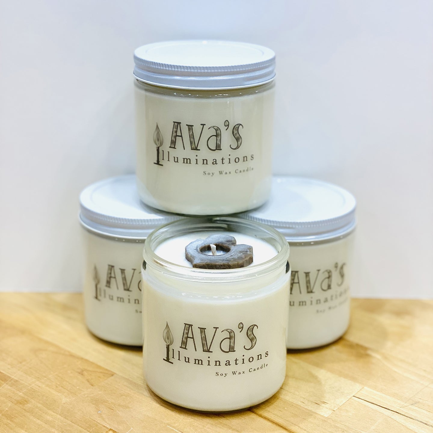 Soy wax candle with Petoskey Stone in the shape of the Michigan mittenby Ava's Illuminations handmade in northern Michigan. 