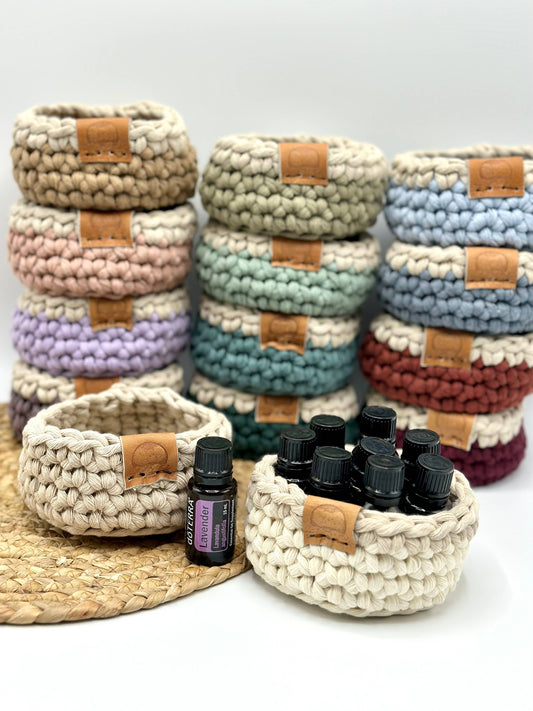 This versatile basket comes with an oat base color and rim. The Boho baskets are perfect for holding essential oils, tinctures, pacifiers, jewelry and more. Handmade.Organic cotton. Safe and non-toxic.