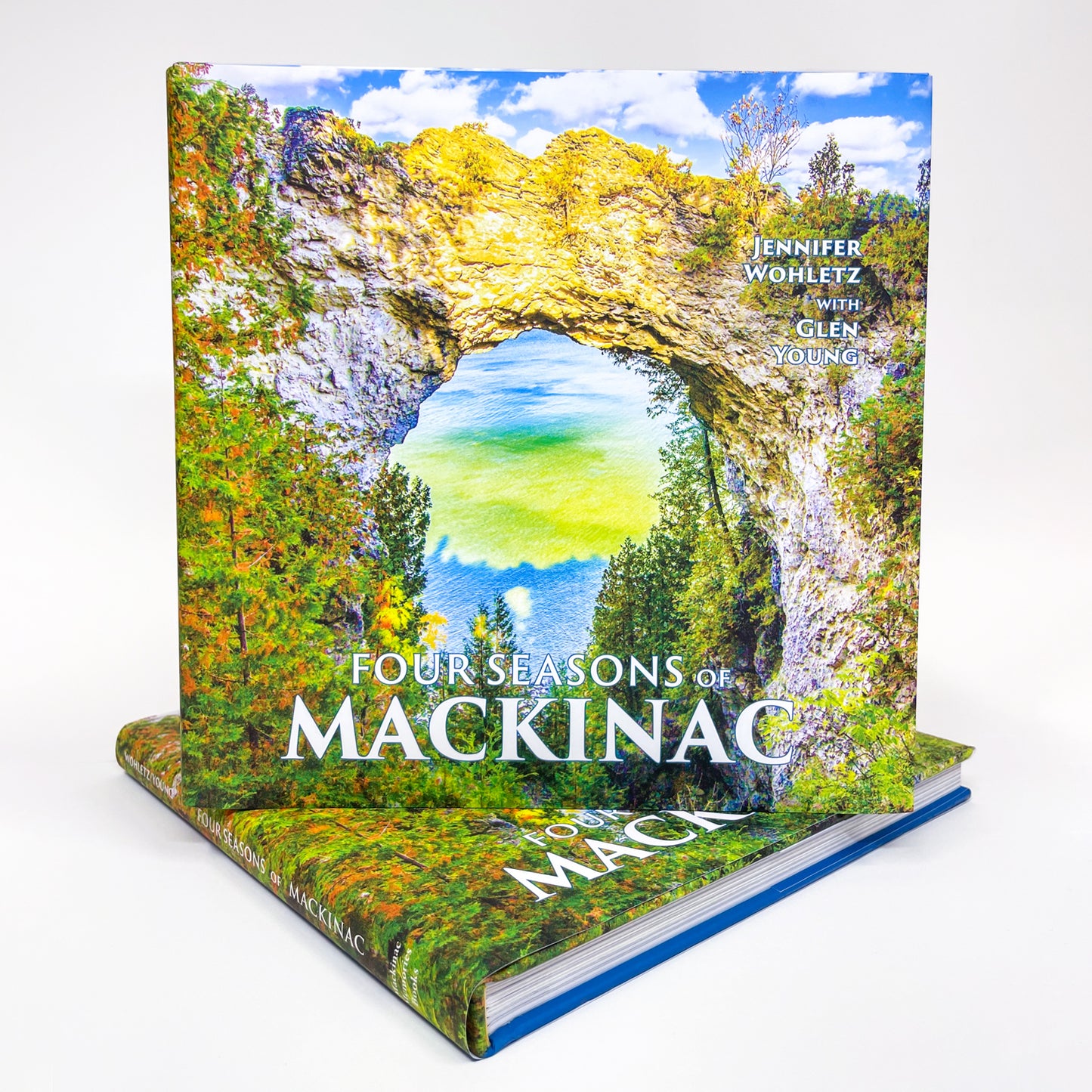 Four Seasons of Mackinac Book by Jennifer Wohletz and Glen Young.  Silver Winner of the 2023 IPBA's Benjamin Franklin's Awards for Coffee Table Books.  