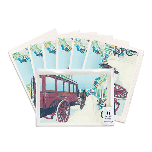 Boxed set of six blank A6 greeting cards featuring a block print of a horse drawn carriage on Mackinac Island's Main Street.