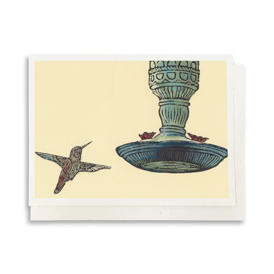 Hummingbird & Feeder.  A casually elegant card featuring a digital reproduction of a block print design with the same title by Natalia Wohletz of Peninsula Prints, Milford and Mackinac Island, Michigan.