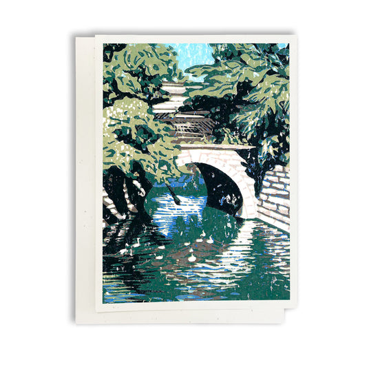 Huron River Bridge. Hummingbird & Feeder. A casually elegant card featuring a digital reproduction of a block print design with the same title by Natalia Wohletz of Peninsula Prints, Milford and Mackinac Island, Michigan.