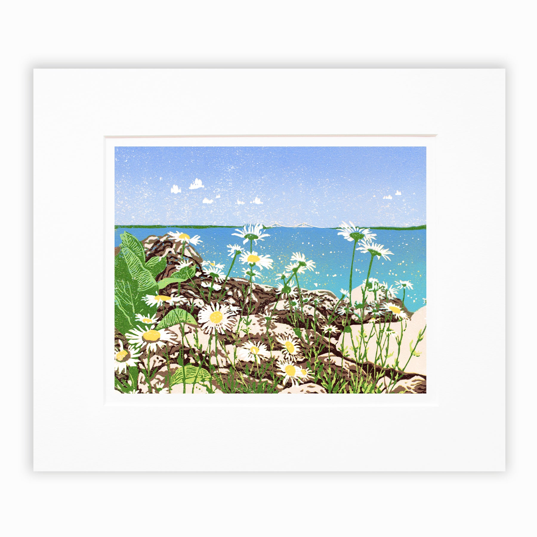 Daisy Shore is a 10" x 8" eight-color reduction block print by Natalia Wohletz of joyful daisies growing amongst limestone rocks on the Mackinac Island shore. Tucked back in the clear blue sky and turquoise water backdrop is the Mackinac Bridge.