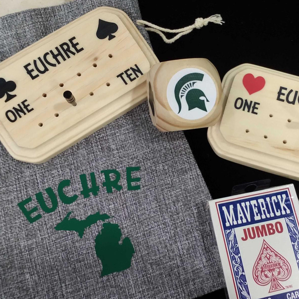 Get ready for a night of Euchre that's Pure Michigan fun with this Michigan State University themed set.