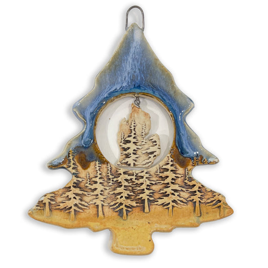 Enhance your holiday decor with a touch of pure Michigan charm! This handcrafted blue and tan tree ornament features a Michigan mitten map in the center, adding a special touch to your Christmas tree. Handcrafted by the ceramic artist Jeanne DeHaan of Milford, Michigan.