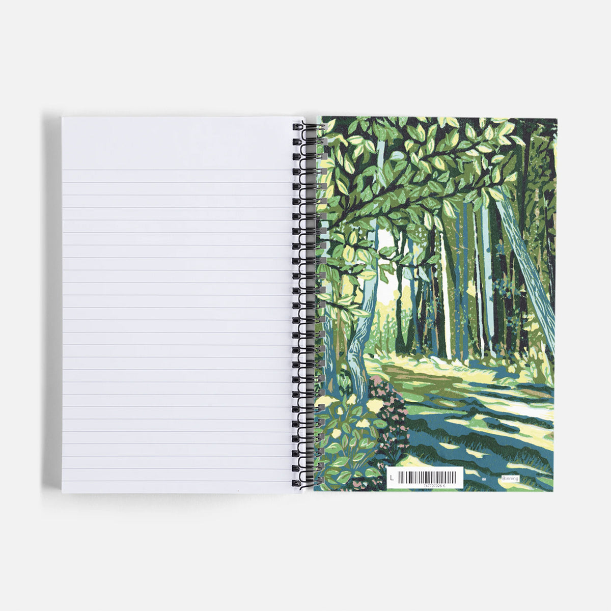 Spiral notebook featuring a block print design of a cedar trail by Natalia Wohletz of Peninsula Prints.