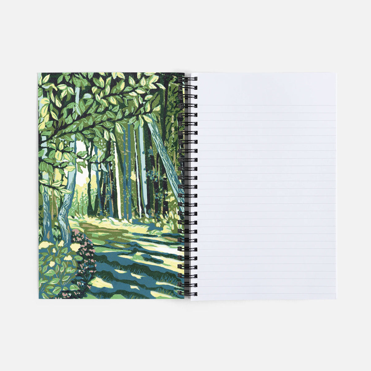 Spiral notebook featuring a block print design of a cedar trail by Natalia Wohletz of Peninsula Prints.