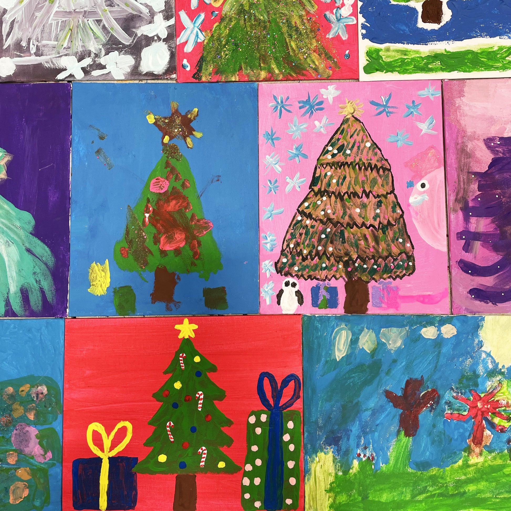 Unique Christmas tree artwork created by talented artists with special needs.  The artists are members of the Peacock Art Club at the Village Fine Art Association's Suzanne Haskew Art Center (SHAC) in Milford, Michigan. 