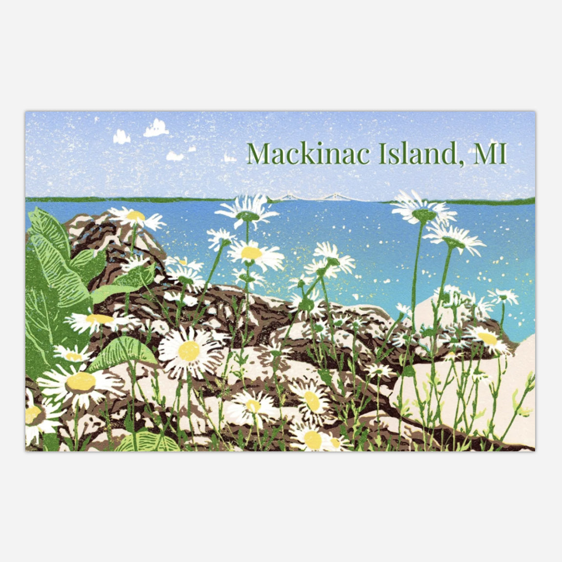 Postcard featuring a block print design of flowers and rocks with 'Mackinac Island, MI' text on a blue sky background