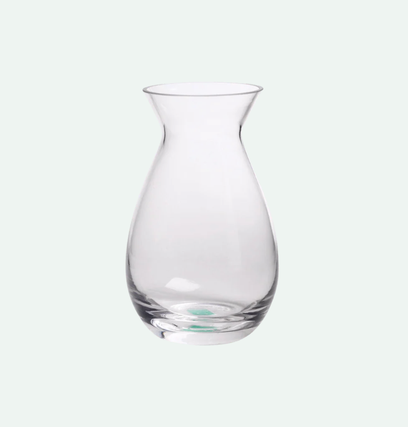 A clear glass bud vase with a bulbous body and a flared rim.