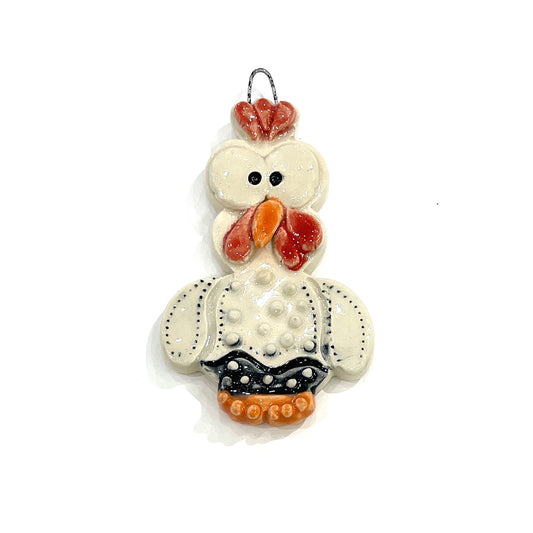 Chicken baby ornament by Jeanne DeHaan. Deck your tree with barnyard personality! This collection of whimsical ceramic chicken ornaments brings rustic holiday cheer to any home.