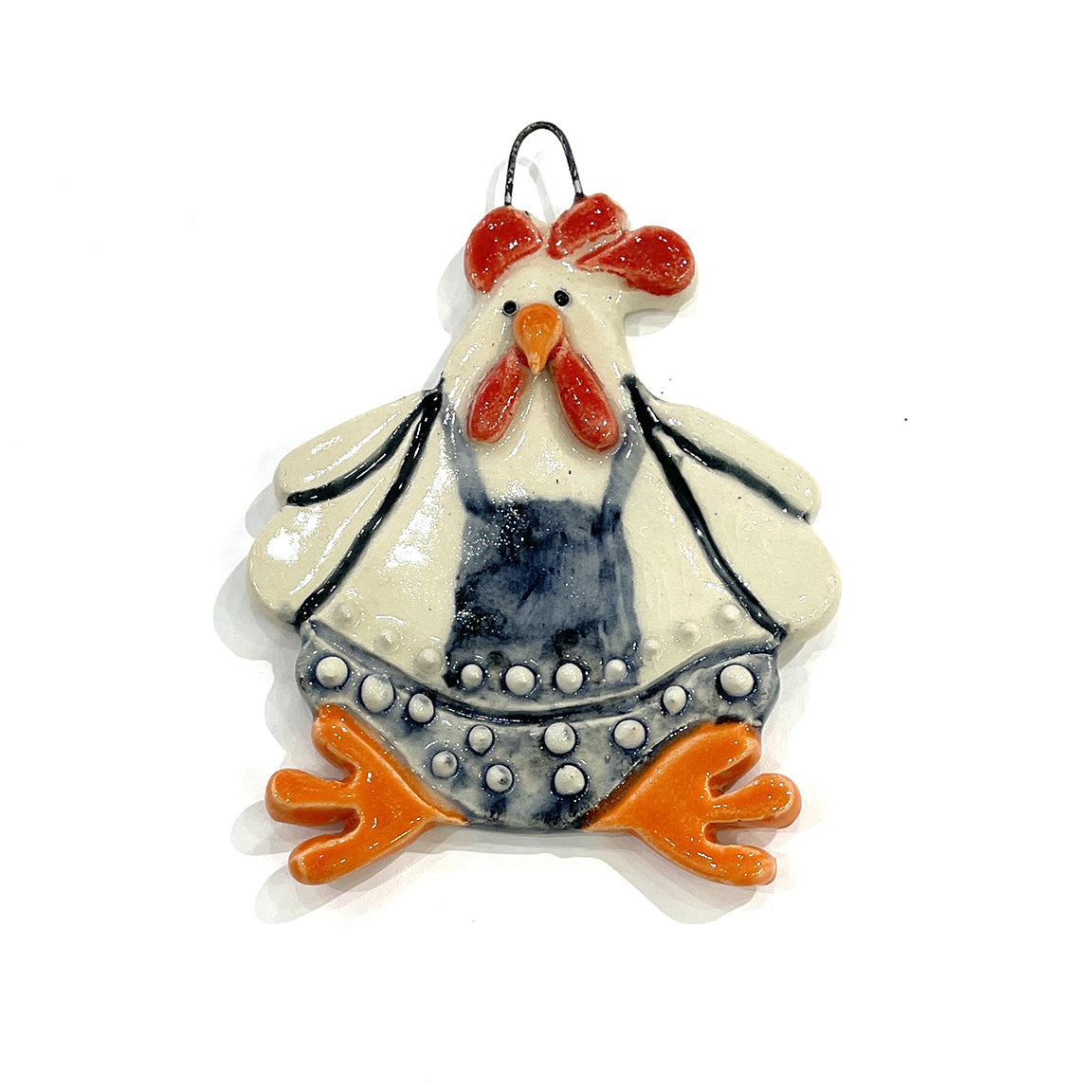 Deck your tree with barnyard personality! This whimsical ceramic chicken ornament, lovingly handcrafted by Michigan artisan Jeanne DeHaan, brings rustic holiday cheer to any home.
