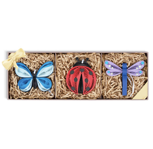 This box set of three handmade insect ornaments features a quilled butterfly, ladybug and dragonfly for styling gift bags, a window, Christmas tree and more.&nbsp;