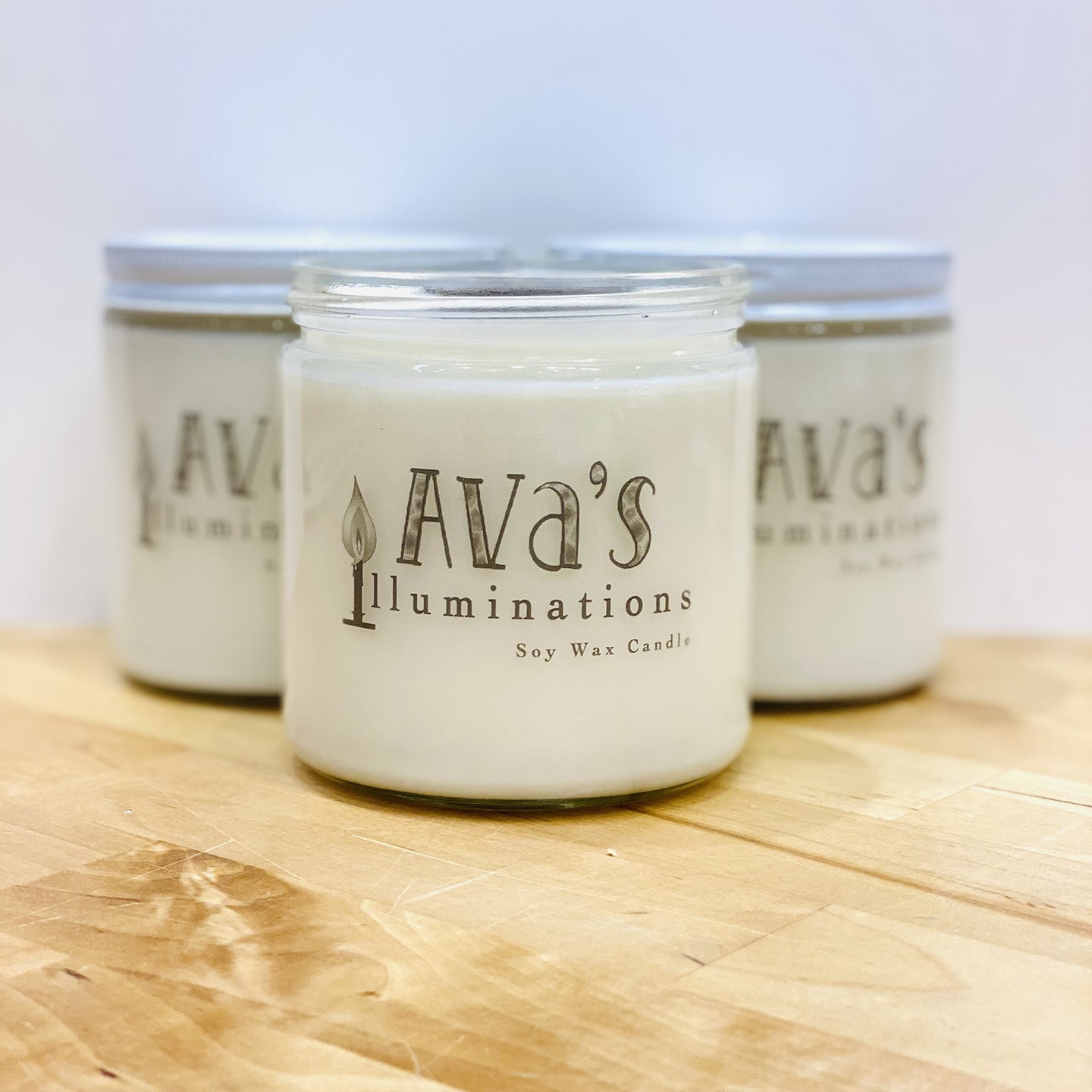 Soy wax candle with Petoskey Stone by Ava's Illuminations handmade in northern Michigan. 