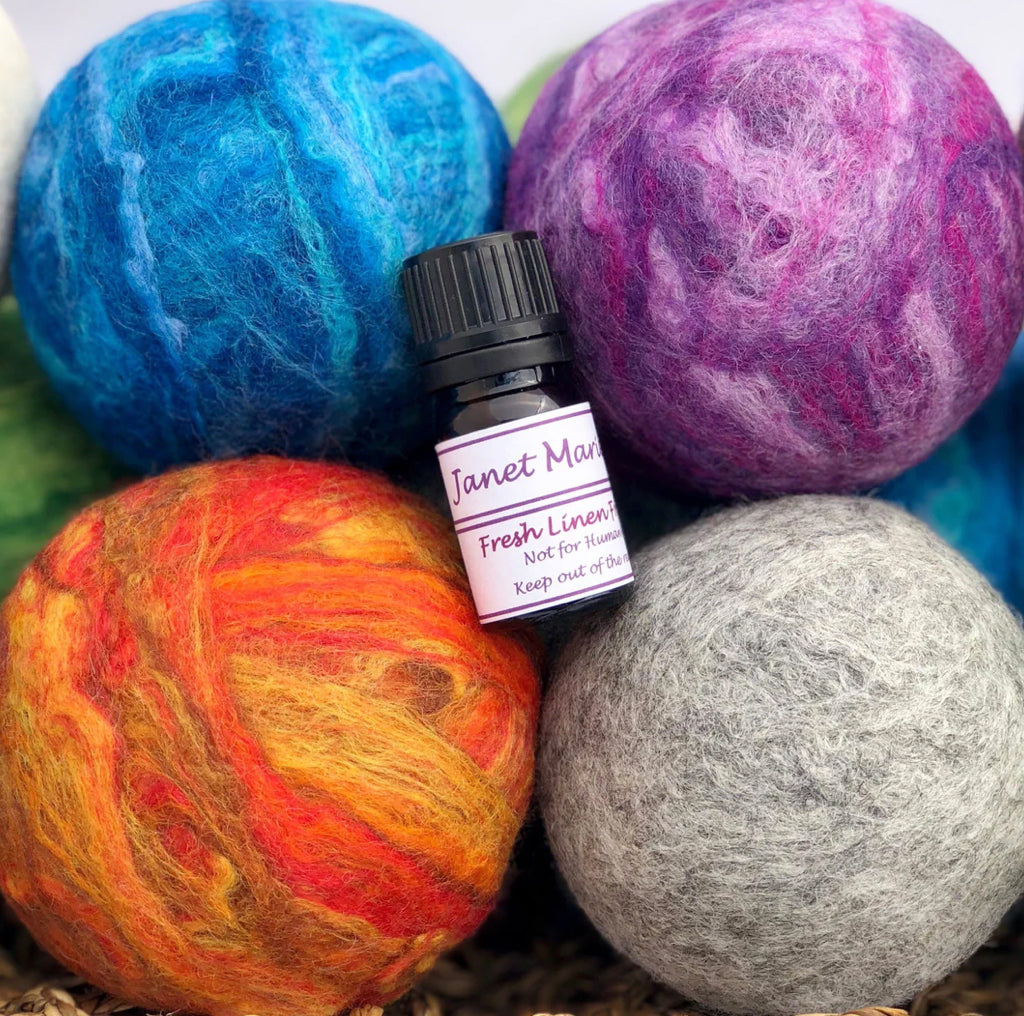 Felted dryer ball set.  An environmentally friendly alternative to dryer sheets.  high-quality, wool dryer balls are beautiful and functional at the same time by Janet Marie Felted Goods.
