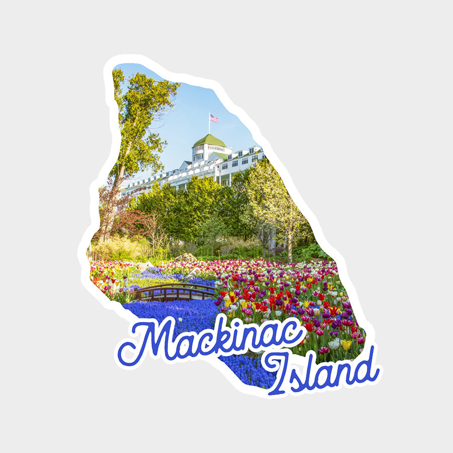 Grand Hotel sticker. This die cut vinyl sticker features grape hyacinths and daffodils blooming in Grand Hotel's Secret Garden framed in the shape of the map of Mackinac Island. 