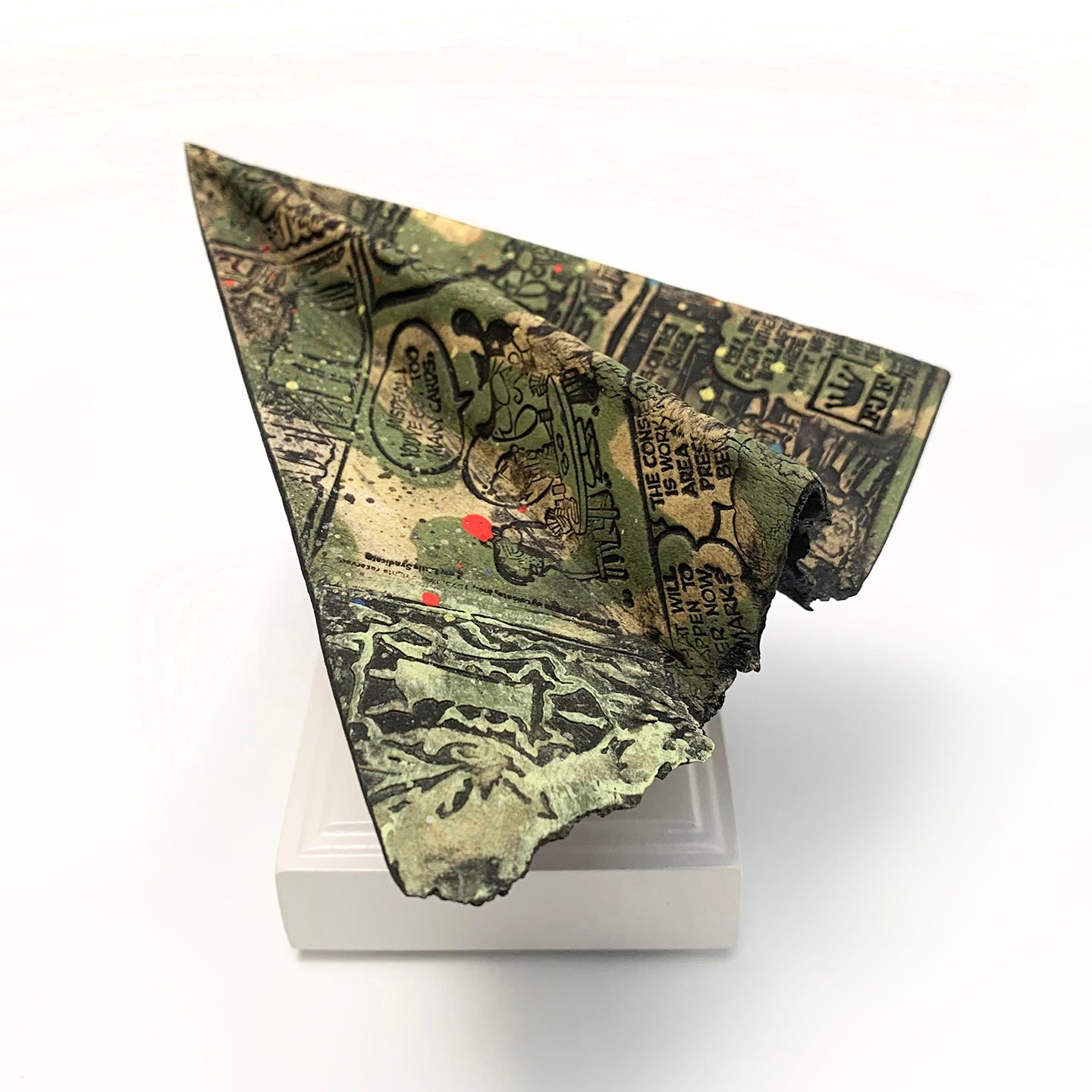 Frank James Fisher's paper airplanes are recognizable icons covered in graphics and commentary.  Slab-Built Paper Clay, Cone 5 Oxidation fired with wood stand. 