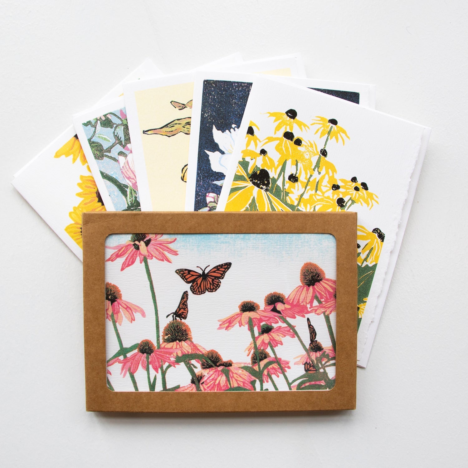 A casually elegant card set featuring floral art by Natalia Wohletz.