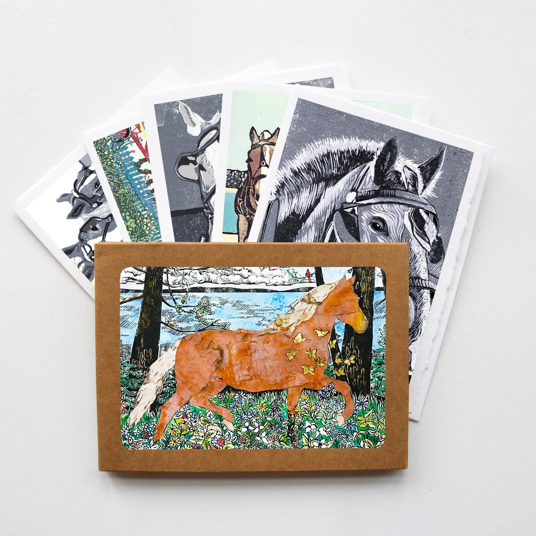 A casually elegant card set featuring Natalia’s block print designs of Mackinac horses.