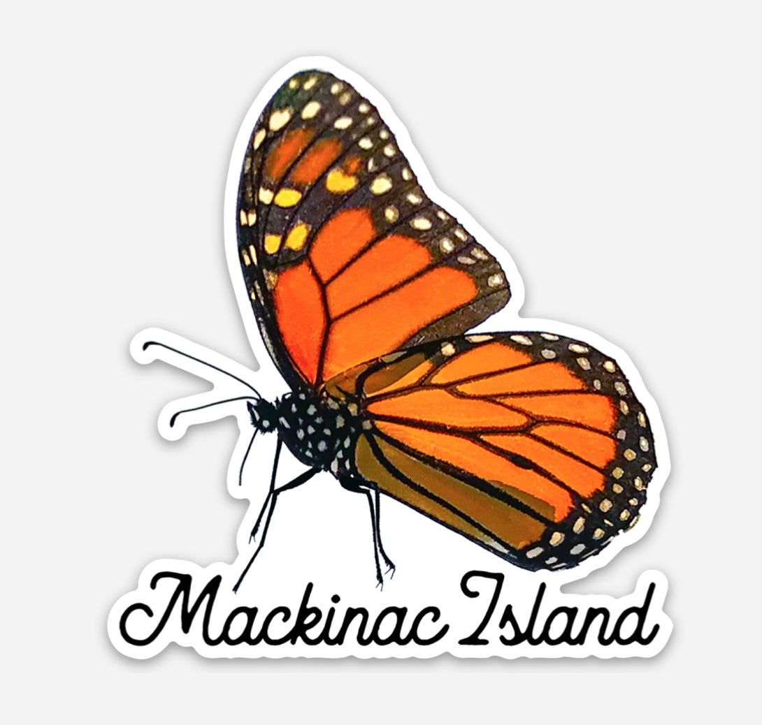 This die cut vinyl sticker features a photograph of a Monarch butterfly on Mackinac Island.