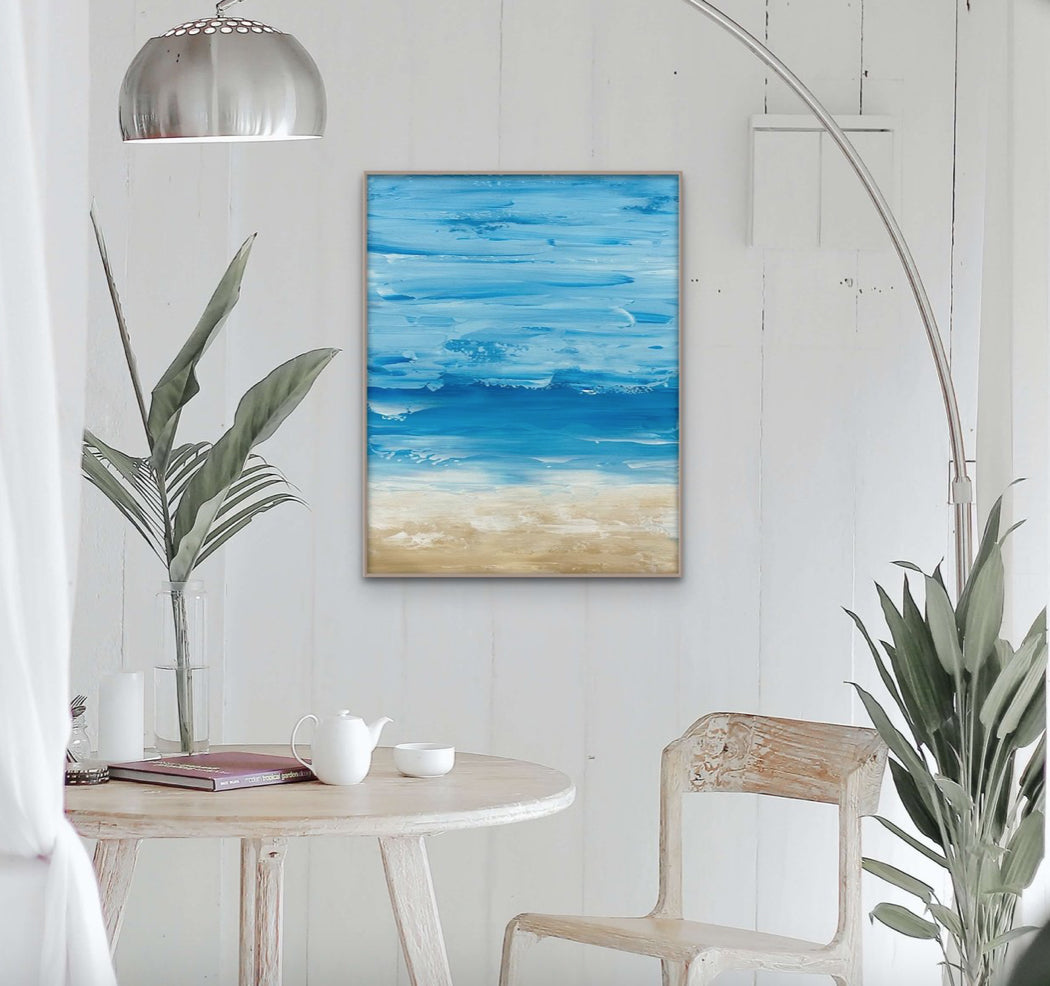 Lakeside living wall art featuring a serene image of waves gently breaking on a sandy beach by Dorothea Sandra.