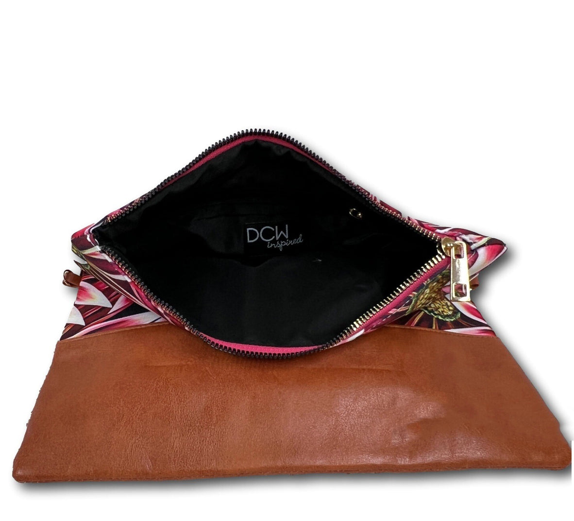 This versatile crossbody by Denise Cassidy Wood of DCW Inspired acts as two bags in one. Attach the crossbody strap for a stylish crossbody bag or remove it and dress up your evening with a fun little clutch.
